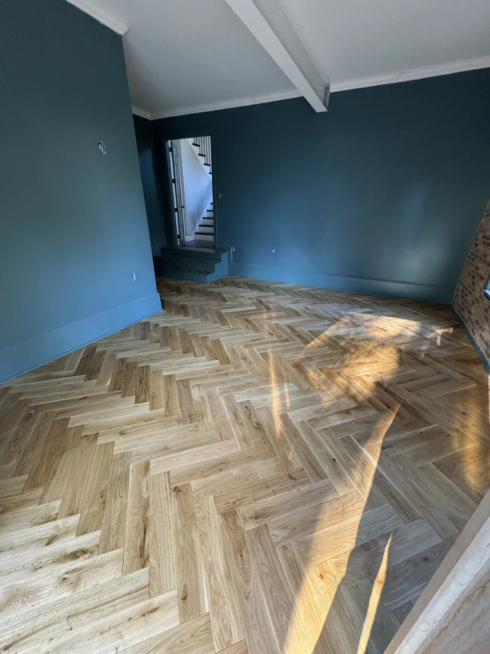 White oak floor laid in a herringbone pattern in a Charlotte home
